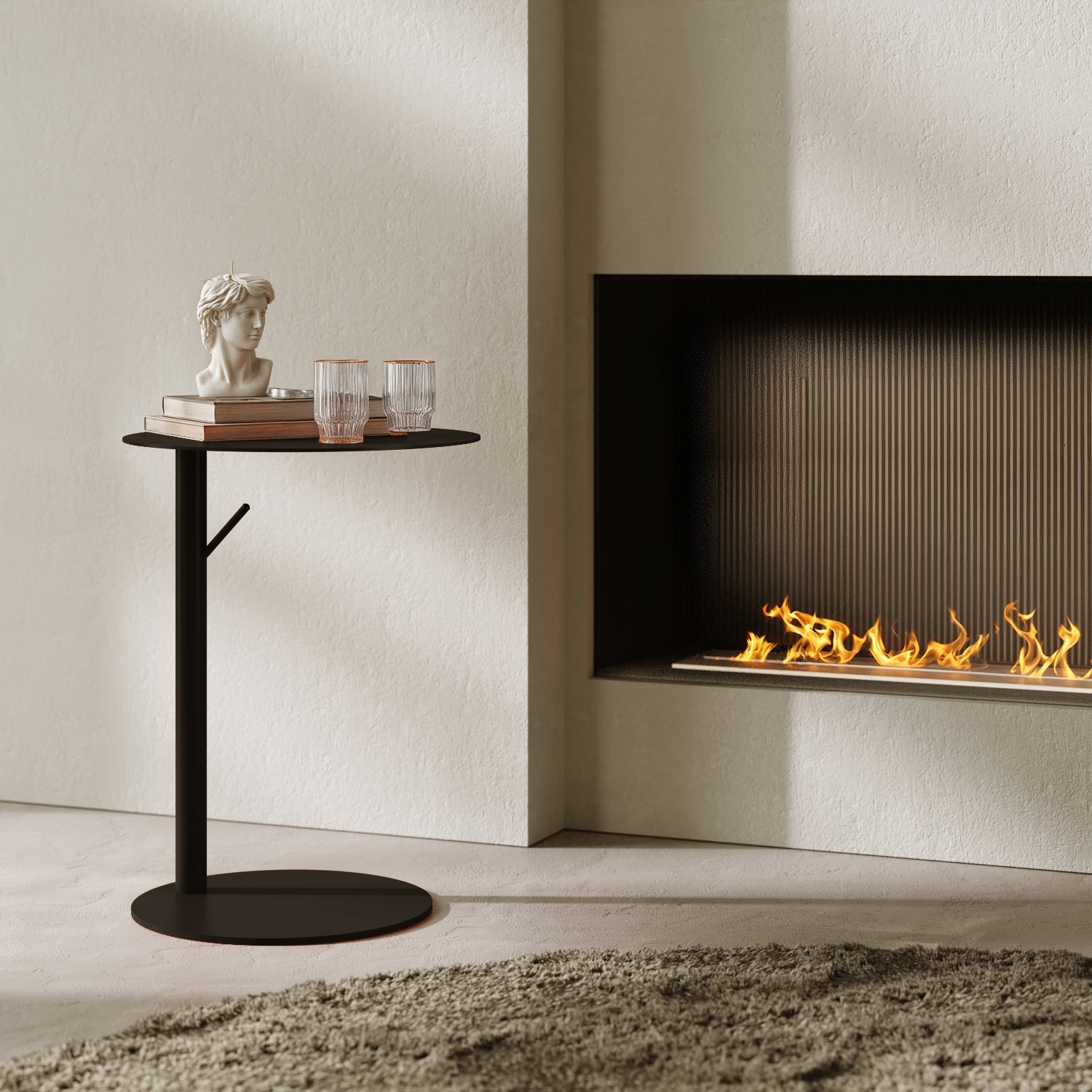 Tavolino Italia rotondo nero in contesto living, abbinato a divano e accessori