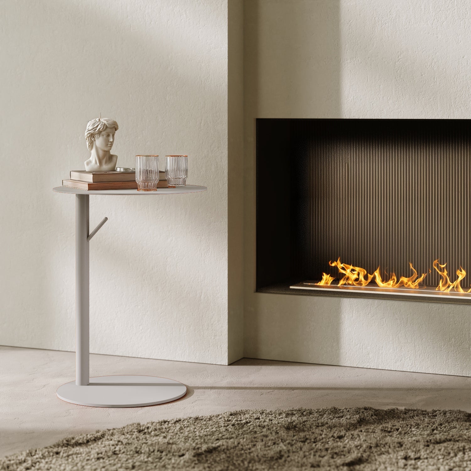 Tavolino Italia rotondo bianco in contesto living, abbinato a divano e accessori