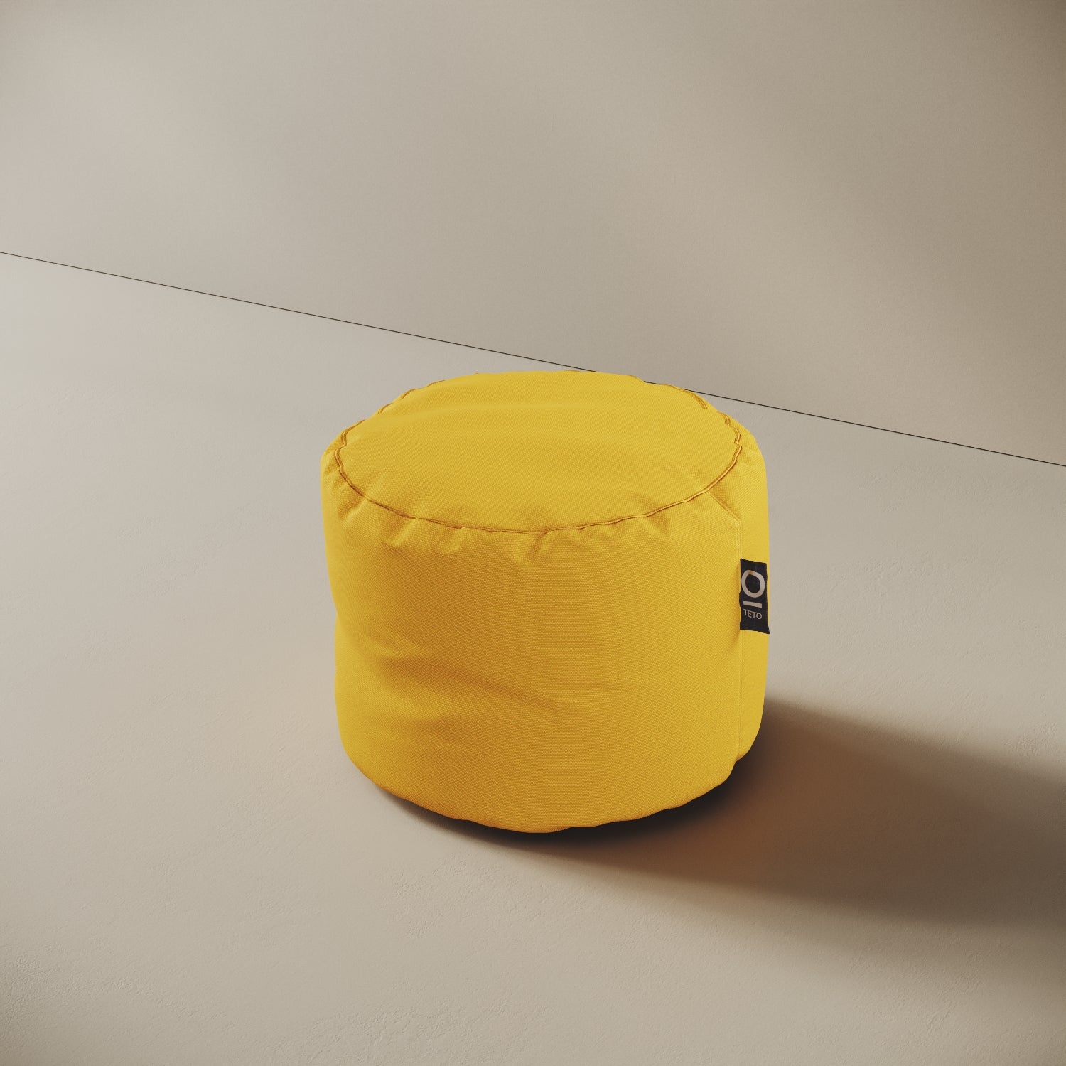 Pouf Adapto giallo, vista laterale — forma cilindrica stabile, ideale come seduta o poggiapiedi
