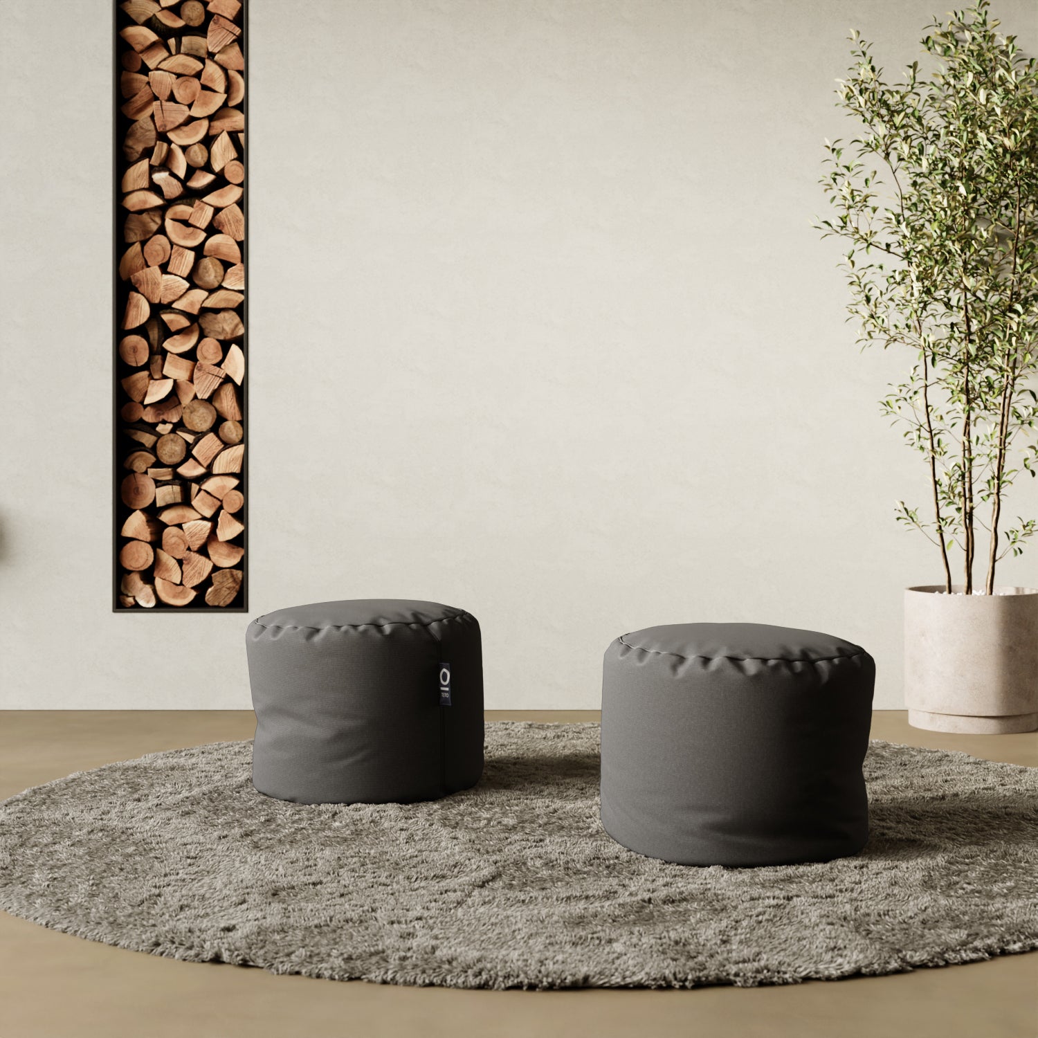Pouf Adapto grigio in contesto living — abbinamento con divano e tappeto moderno