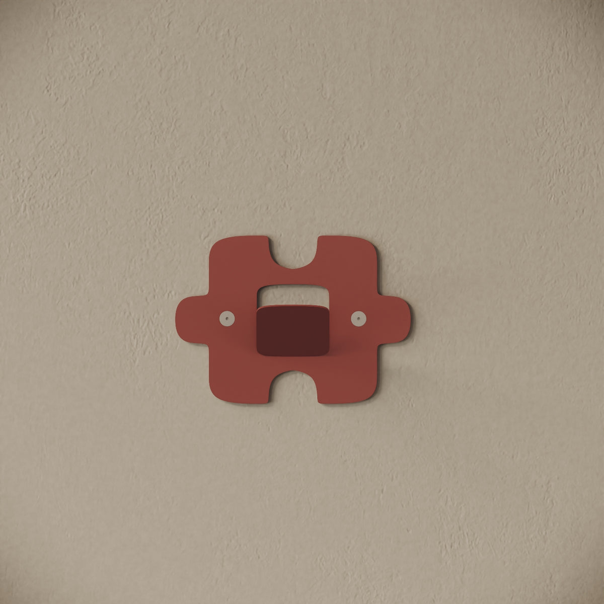 Appendiabiti da muro Puzzle rosso, vista frontale – ferro verniciato, gancio integrato