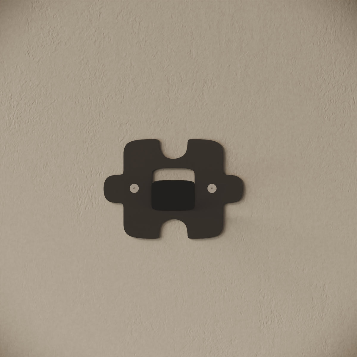 Appendiabiti da muro Puzzle nero, vista frontale – ferro verniciato, gancio integrato