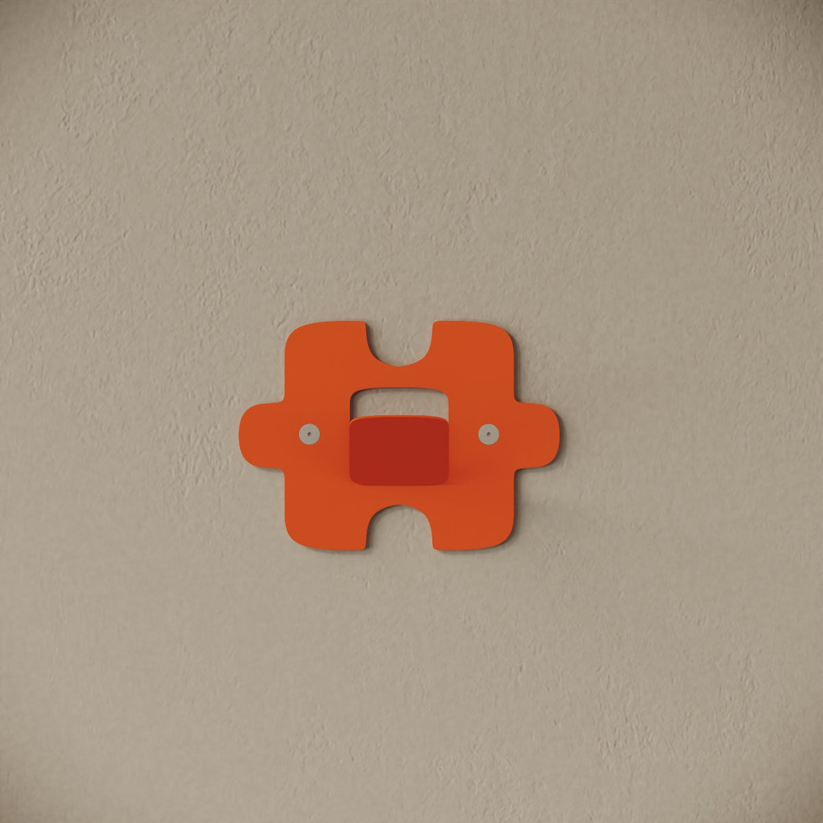 Appendiabiti da muro Puzzle arancione, vista frontale – ferro verniciato, gancio integrato