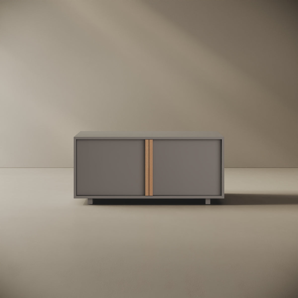 Mobile TV ILE grigio taglia S, vista frontale — legno nobilitato bordato con tagli a 45°, maniglia a filo in faggio naturale, 110×45×50 cm, design Mario Alessiani