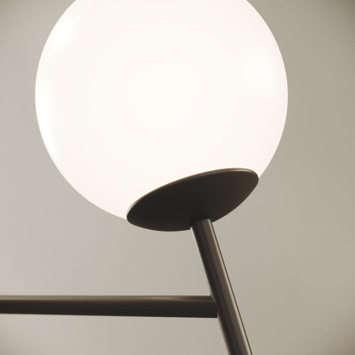 OMINO lampada da tavolo nero finitura Push, dettaglio della base in ottone verniciato nero opaco e del profilo curvilineo