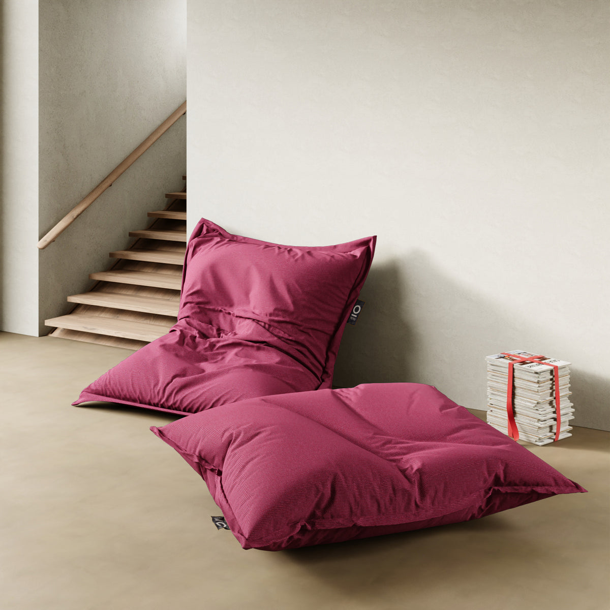 BeanB poltrona a sacco grigio in zona relax — abbinamento con lampada e libreria
