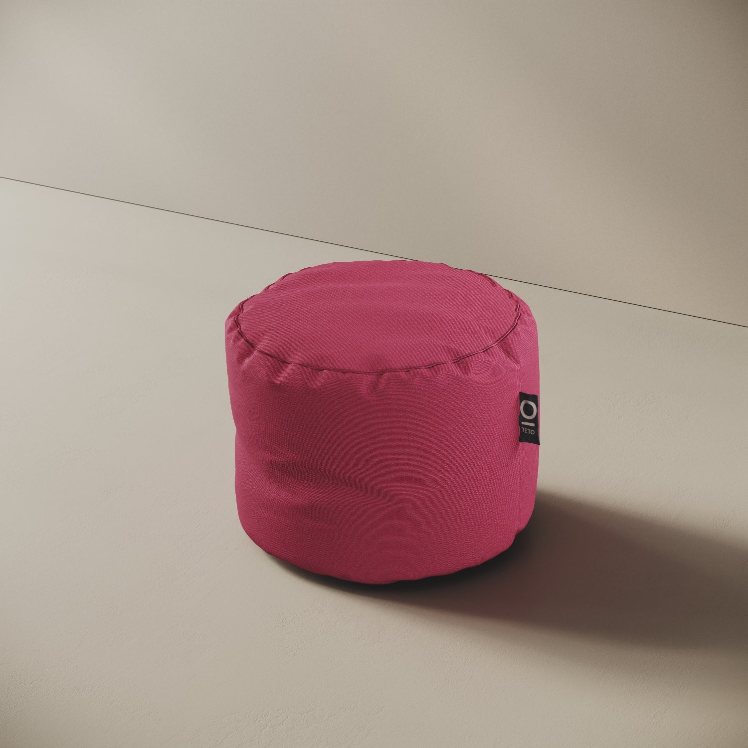 Pouf Adapto fucsia, vista laterale — forma cilindrica stabile, ideale come seduta o poggiapiedi