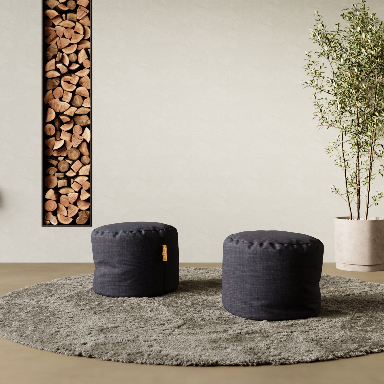 Pouf Adapto jeans in contesto living — abbinamento con divano e tappeto moderno