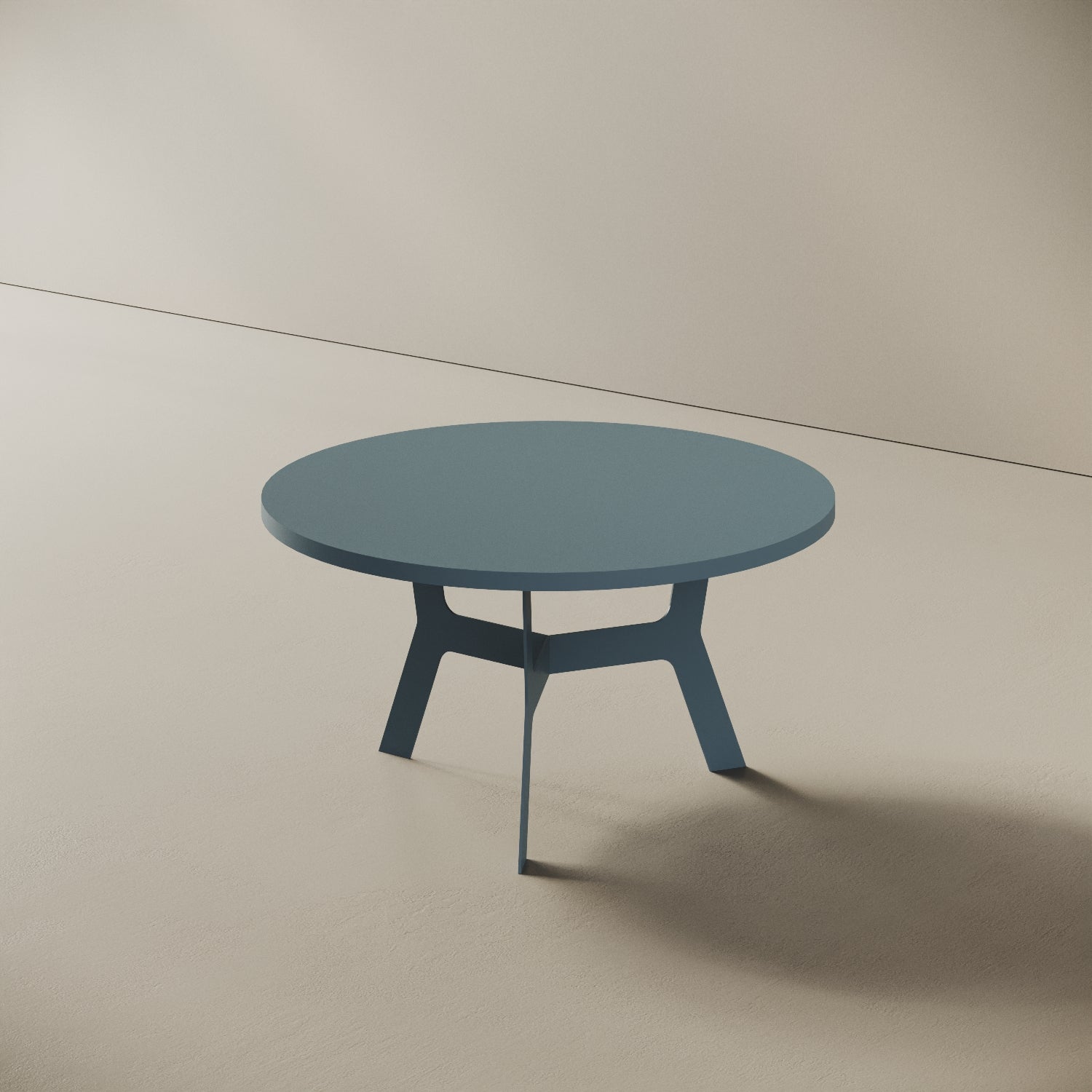 Madrid tavolino da caffè rotondo blu basso, vista laterale — gambe in metallo blu e piano in legno nobilitato